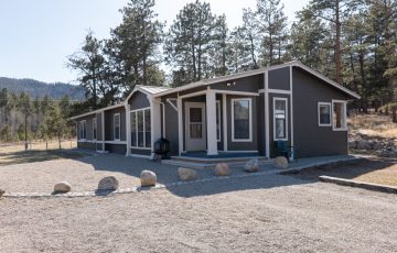 Ranch House Our 1,800 SF Luxury one-level ranch house with grand, sweeping views of Pikes Peak. Modern amenities with a rustic feel with an open concept living, copper soaking tub in King on-suite bath, and more Sleeps 8.